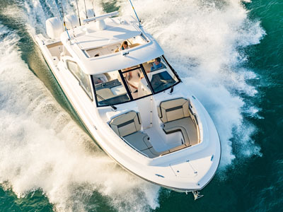 Aerial front view of white Pursuit D 365 Denali dual consloe Boat.