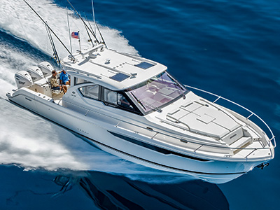 A front view of Pursuit OS 445 Offshore boat