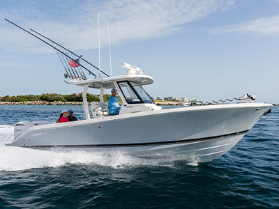 Aerial one quarter profile view of the S 288 Center Console Sport boat running right.