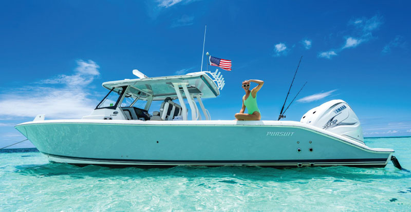 Woman on a Pursuit Boat from Pursuit magazine EXPLORE.