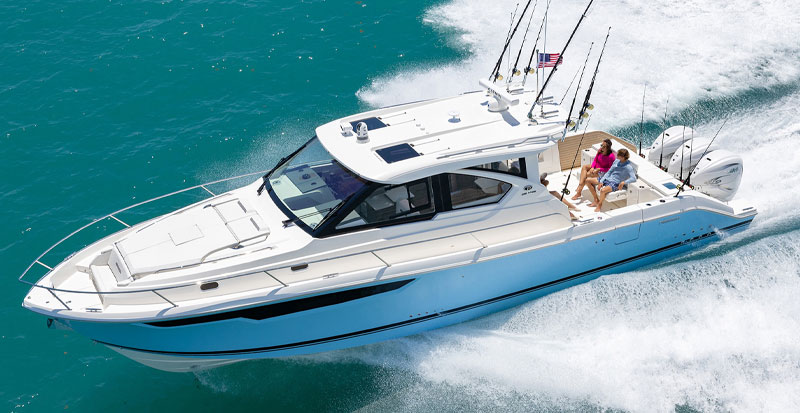 The Pursuit Boat OS 445 running shown in the Pursuit magazine EXPLORE.