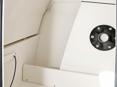 A view of dedicated storage for table on the 25’ D 246 Pursuit Luxury Dual Console Boat