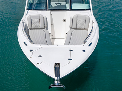 A front view of lounge bowrider seats on the D 246 Pursuit Luxury Dual Console boat.