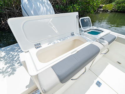 A livewell and fish box makes this D 246 Pursuit Luxury Dual Console boat ready for a day of fishing.