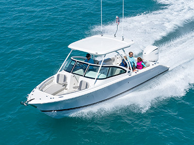 A view from above of a D 246 Pursuit Luxury Dual Console Boat running left offshore.