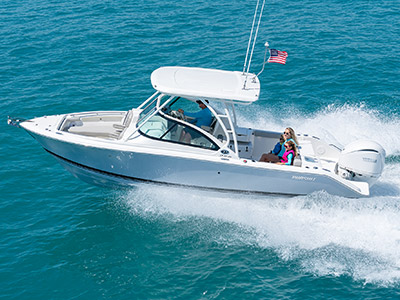 A D 246 Pursuit Luxury Dual Console boat with a Yamaha engine is running in the ocean.