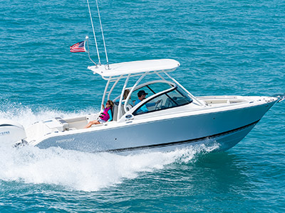 D 246 Pursuit Luxury Dual Console boat running right in the offshore.