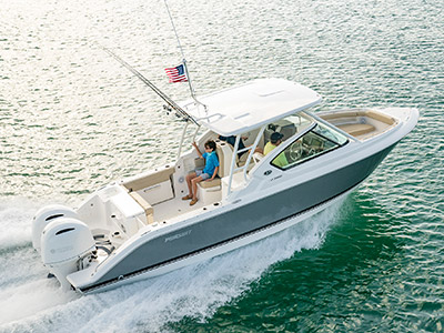 Aerial starboard side running shot of titanium Pursuit D 266 luxury dual console boat.