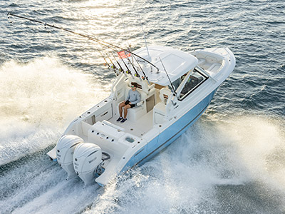 Aerial view of a Pursuit Dual Console breaking waves.