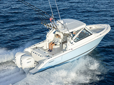 Pursuit Boats D 286 dual console is cruising offshore.