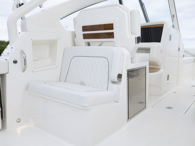 View of aft facing seat an a Dual Console Pursuit boat.