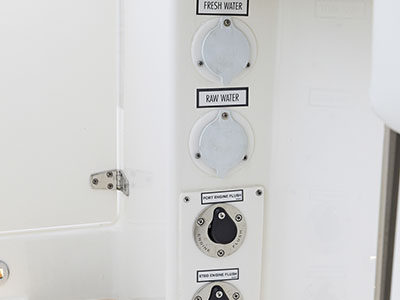 Fresh and raw water connections on a Purusit D 286 Dual Console boat.