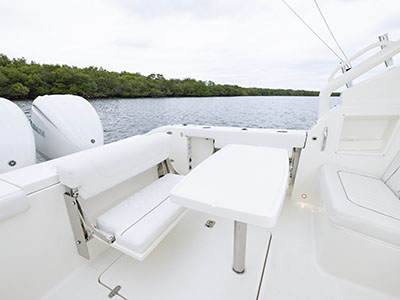 Cockpit a Pursuit Boat Dual Console boat fit for entertaining onboard.