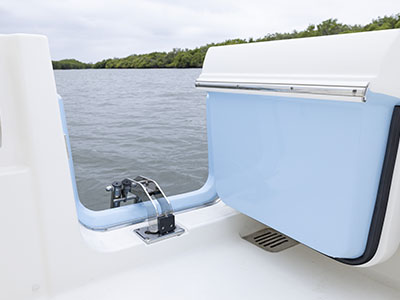 Dive door open on a Dual Console Pursuit boat.