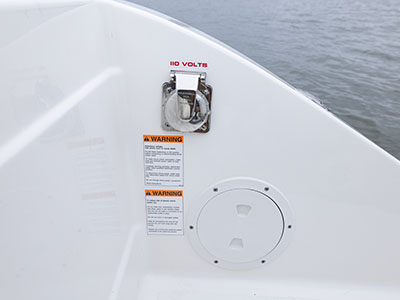 Shore power hookup is available in the transom of a Pursuit boat Dual Console boat.