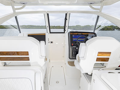 View with Dual console door and window closed on Pursuit Boats D 286 Dual Console boat.