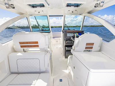 A view of the bridge deck and windshield on a Pursuit D 306 Luxury Dual Console boat.