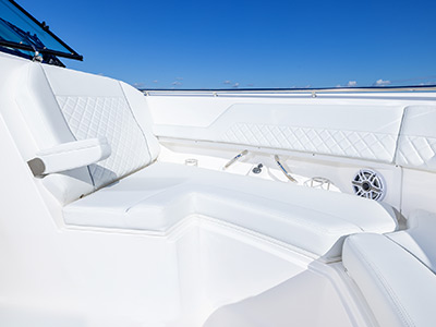 Bow seats with diamond upholstery on Luxury Dual Console Pursuit Boat