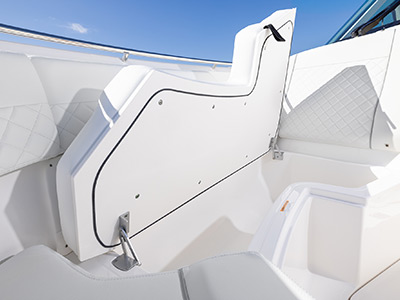 Seat open shows storage space on a Pursuit Boats D 326