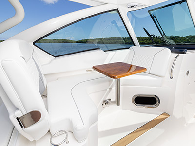 View of lounge area on Bridge Deck of Pursuit Boats Luxury Dual Console