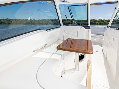 Image of lounge area with table and windshield open