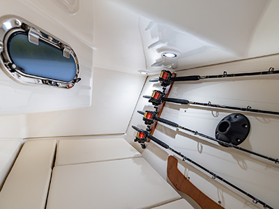 Rod storage with lounger down on 32 ft. Luxury Dual Console Pursuit Boat