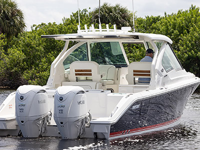 Pursuit Boats D 326 Luxury Dual Console boat in flag blue