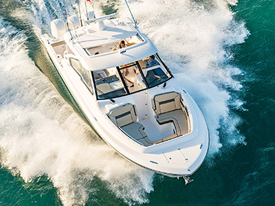Aerial front view of white Pursuit D 365 luxury dual console boat.