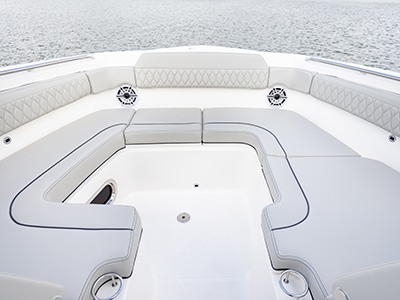Pursuit D 365 luxury dual console boat bow social zone.