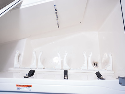 Pursuit D 365 luxury dual console boat bow under seat storage.