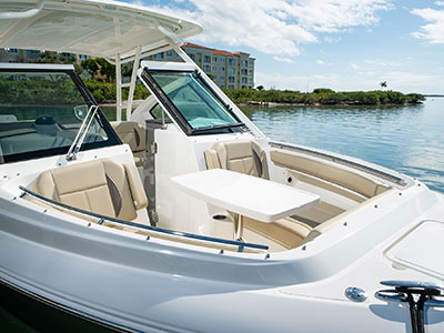 Bow area of Pursuit DC 266 dual console boat with fiberglass table.