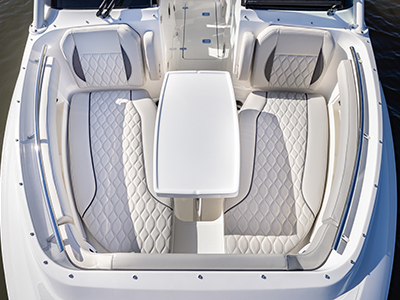 Overhead view of forward lounge seating on the DC 266 Pursuit Luxury Dual Console Boat with removable table.