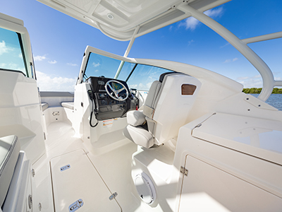 Bridge view of social zone of Pursuit DC 266 luxury dual console boat.