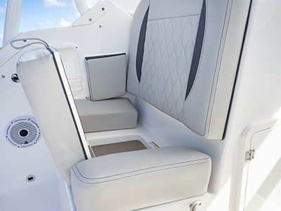 Aft facing cockpit seat of Pursuit DC 266 luxury dual console boat.