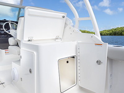 Molded entertainment center with sink on Pursuit DC 266 luxury dual console boat.