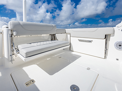 Folding transom seating of Pursuit DC 266 luxury dual console boat.