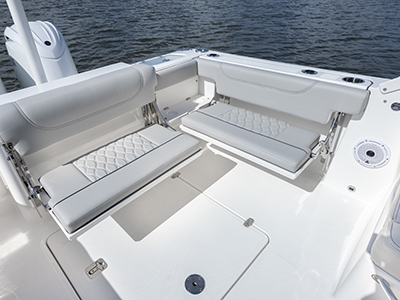Folding transom seating of Pursuit DC 266 luxury dual console boat.