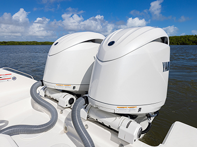 Twin Yamaha Engines on transom of the Pursuit DC 266 luxury dual console boat.