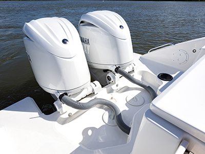 Twin Yamaha Engines on transom of the Pursuit DC 266 luxury dual console boat.