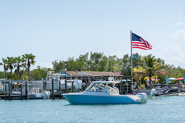 The Pursuit DC 286 cruises by Little Jim’s Marina in Ft. Pierce, FL.