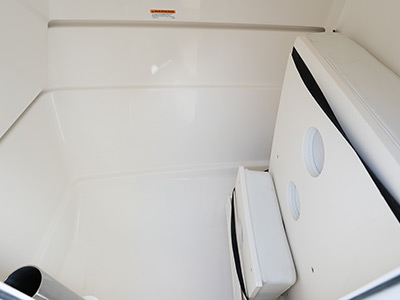 Dedicated storage of sun pad on the Pursuit DC 286 Dual Console boat.