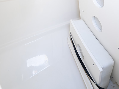 Dedicated storage of sun pad on the Pursuit DC 286 Dual Console boat.