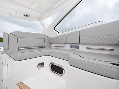 Pursuit DC 365 luxury dual console boat forward seating.