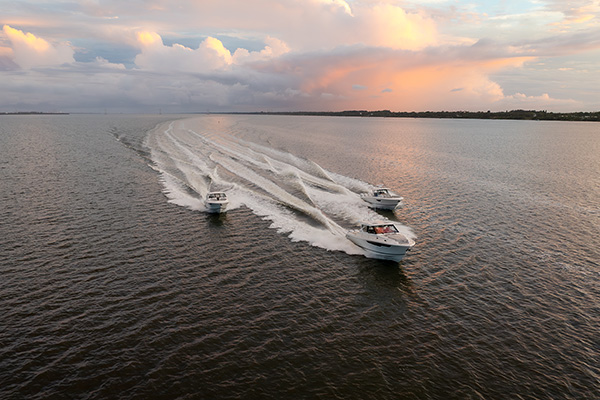 Pursuit Boats DC 365 Dual Console, OS 445 Offshore and S 428 Sport Center Console running.