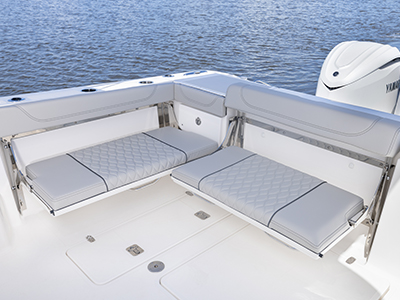 Detail view of OS 355 offshore boat folding transom seating.