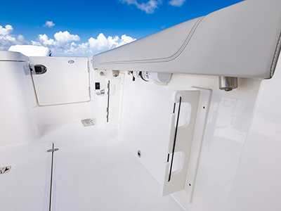 Gunnel rod storage on Pursuit OS 355 Offshore cabin cruiser fishing boat.