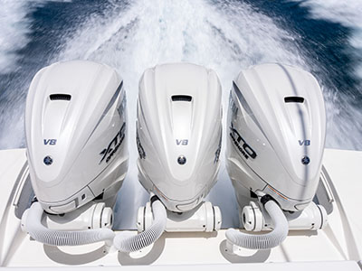Yamaha XTO V8 outboard cowlings on a Pursuit OS 445 seen from above with the wake behind.