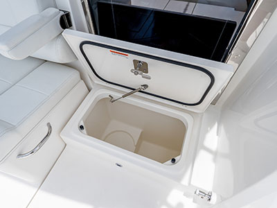 Open insulated fish box in the cockpit of a Pursuit OS 445.