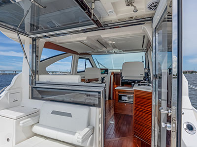 View from the cockpit through the sliding door into the salon of a Pursuit OS 445.