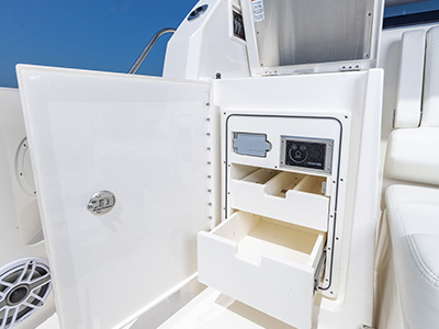 Dedicated tackle storage under grill on Pursuit OS 445 Offshore